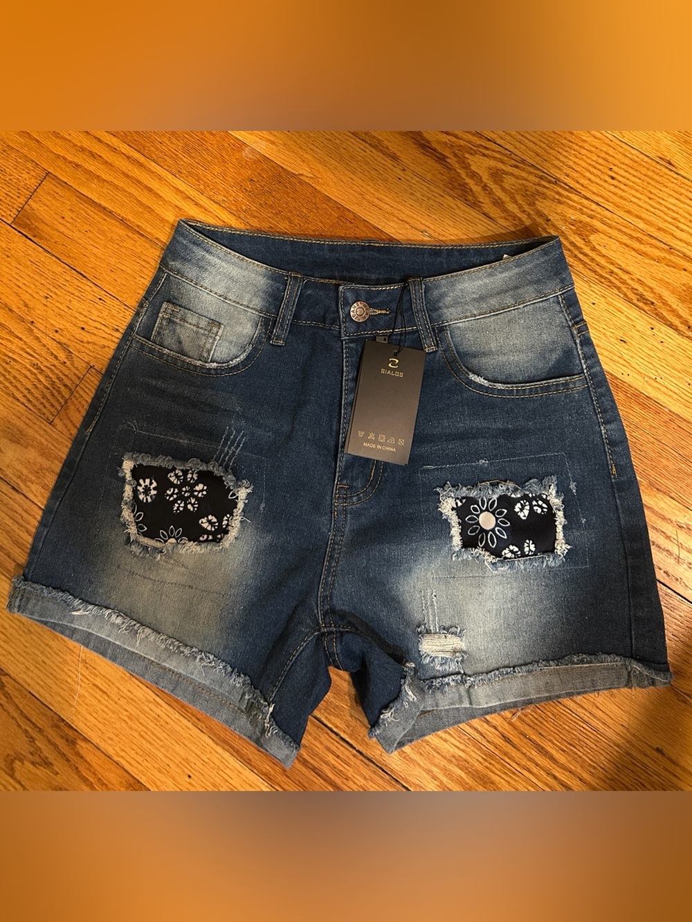 Women’s Dark Blue Distressed Denim Shorts with Bandana Patch Accents